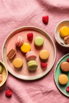 Composition of plates with various macaroons Stock Photos