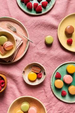 Composition of plates with various macaroons Stock Photos