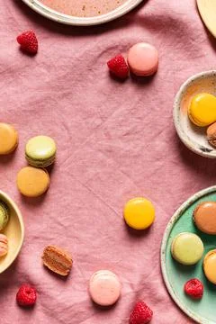 Composition of plates with various macaroons Stock Photos