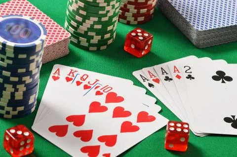 Composition with playing cards on green table Stock Photos