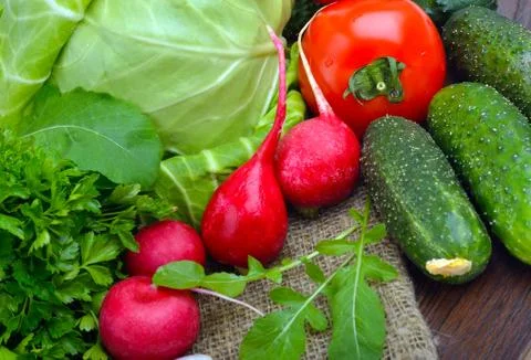Composition with raw vegetables on sacking Stock Photos