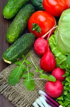 Composition with raw vegetables on sacking Stock Photos