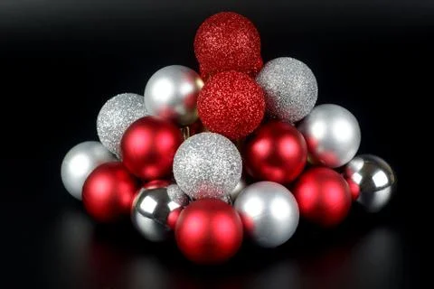 Composition from a red and silver shiny and matte christmas balls close up vi 스톡 사진
