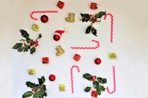 Composition with red berries, holly leafs and berries, balls, pine cones, Chr Stock Photos