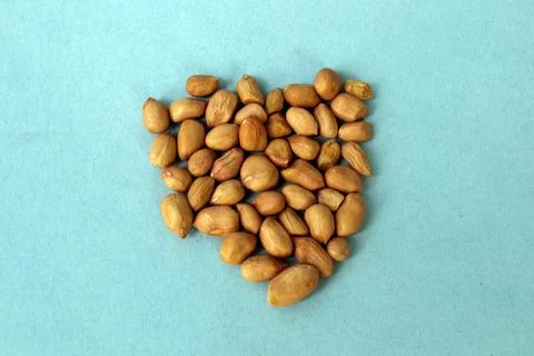 Composition of ripe beans on a bright blue Stock Photos