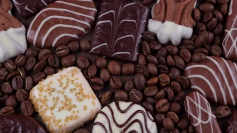 Composition rotating chocolate chip cookies of various shapes and chocolates and Stock Footage 167702929