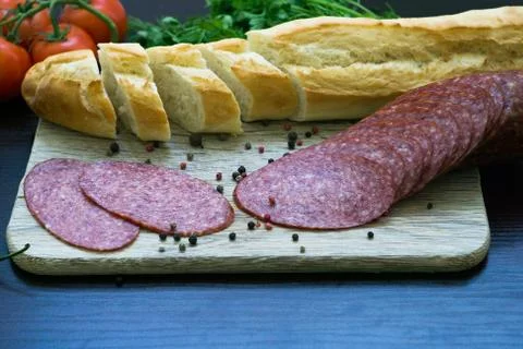 Composition with sausage on the table Stock Photos