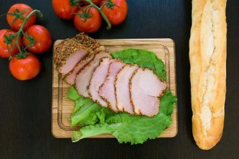 Composition with sausage on the table Stock Photos