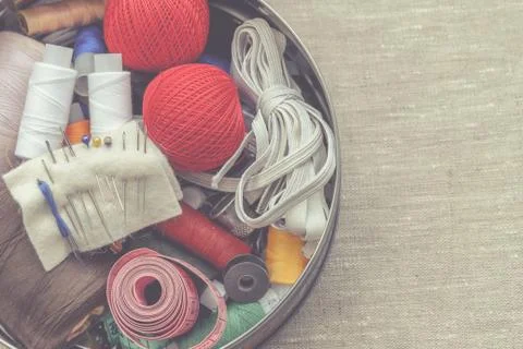 Composition of seamstress, tailor, thread for sewing and for knitting Stock Photos