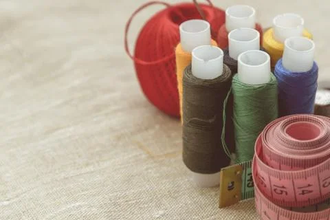 Composition of seamstress, tailor, thread for sewing and for knitting Stock Photos