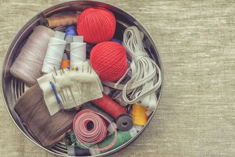 Composition of seamstress, tailor, thread for sewing and for knitting Stock Photos
