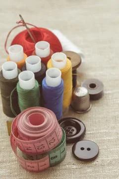 Composition of seamstress, tailor, thread for sewing and for knitting Stock Photos
