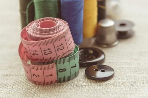 Composition of seamstress, tailor, thread for sewing and for knitting Stock Photos