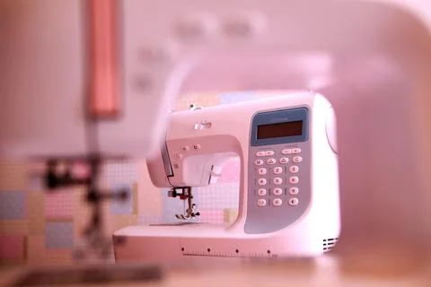 Composition from a sewing machine. Mannequin, flowers on a retro table and th Stock Photos