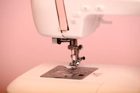 Composition from a sewing machine. Mannequin, flowers on a retro table and th Stock Photos