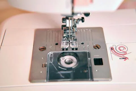 Composition from a sewing machine. Mannequin, flowers on a retro table and th Stock Photos