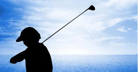 Composition of silhouette of golf player over clouds on blue sky with copy space Foto stock