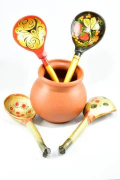 Composition, small brown clay pot for sauces, soups, kitchen item, wooden spo Stock Photos