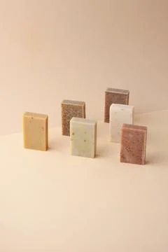 Composition with soap on pastel beige background. Close up, copy space. Stock Photos