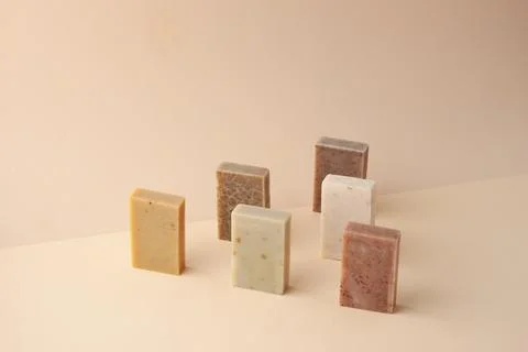 Composition with soap on pastel beige background. Close up, copy space. Stock Photos