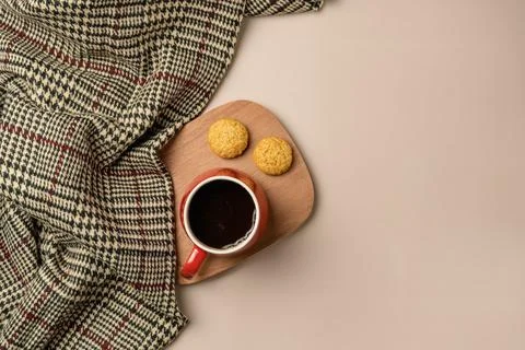 Composition with soft plaid and cup of tea. Copy space Stock Photos
