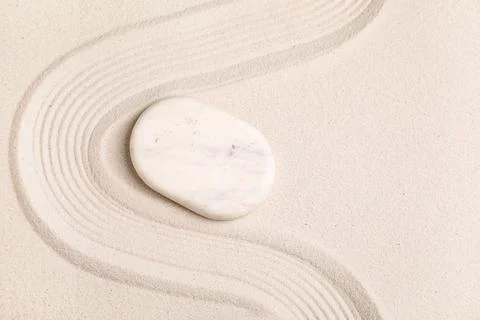 Composition with spa stone and lines on sand as background, closeup. Zen conc Stock Photos