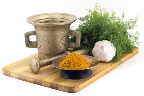 Composition of spices, Imerin saffron, dill, garlic, vintage spice grinder .. Stock Photos
