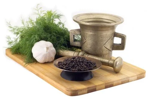 Composition of spices,Malabar pepper , dill, garlic, vintage spice grinder is Stock Photos