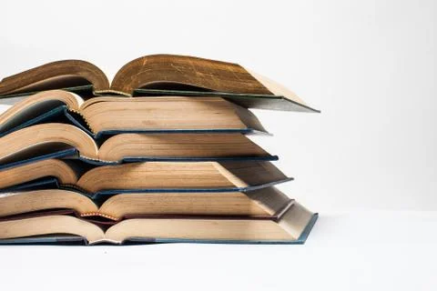 Composition with stack of books on white background Stock Photos