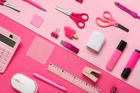Composition with stationery and modern flash drive on pink background Foto stock
