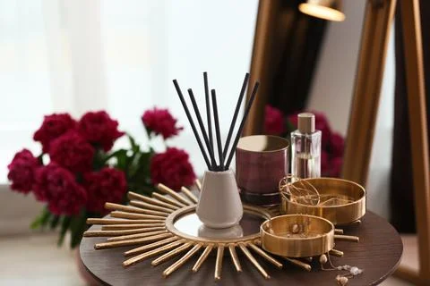 Composition with stylish accessories and interior elements on table indoors 库存照片