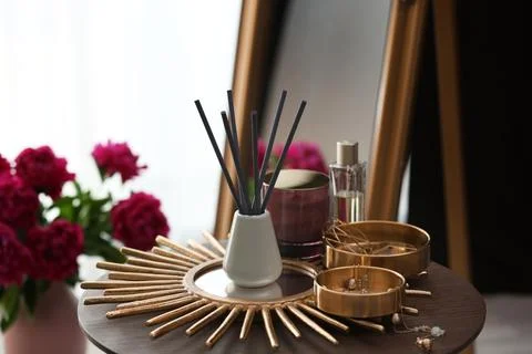 Composition with stylish accessories and interior elements on table indoors 스톡 사진