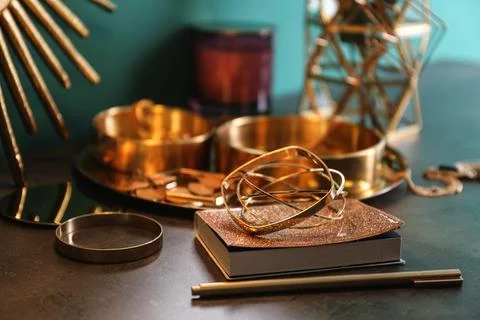 Composition with stylish accessories and interior elements on grey table Foto stock
