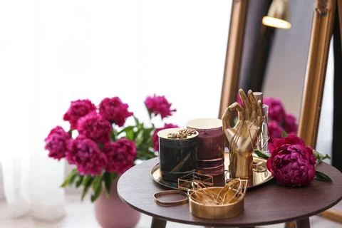 Composition with stylish accessories and interior elements on table indoors Stock Photos