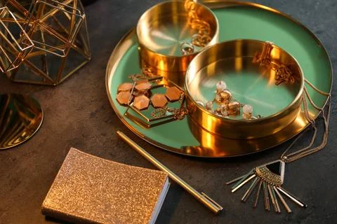 Composition with stylish accessories on grey table. Interior elements Stock Photos