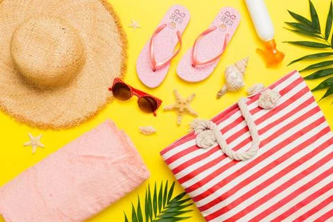 Composition with stylish beach accessories on colored background, top view... Stock Photos