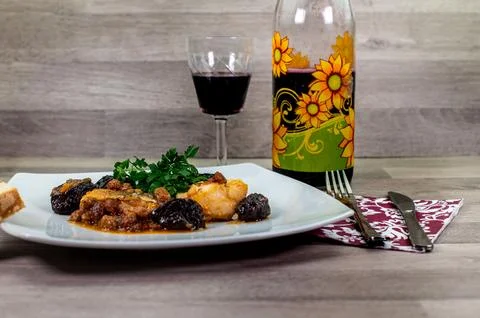 Composition at the table of a plate of sweet and sour cod Stock Photos
