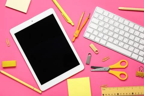 Composition with tablet computer, keyboard, stationery and modern flash drive Stock Photos