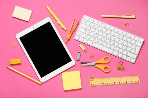 Composition with tablet computer, keyboard, stationery and modern flash drive Stock Photos