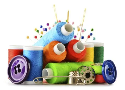 Composition with tailor threads over white background Stock Photos