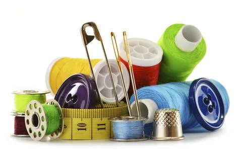 Composition with tailor threads over white background Stock Photos
