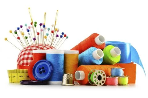 Composition with tailor threads over white background Stock Photos