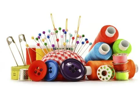Composition with tailor threads over white background Stock Photos