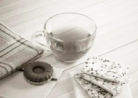 The composition of the tea beverage in a large bowl and some sweets Stock Photos