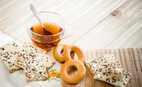 The composition of the tea beverage in a large bowl and some sweets Stock Photos