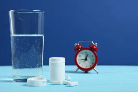 Composition on the theme of insomnia on a colored background Stock Photos
