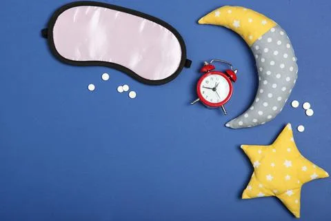 Composition on the theme of insomnia on a colored background Stock-Fotos