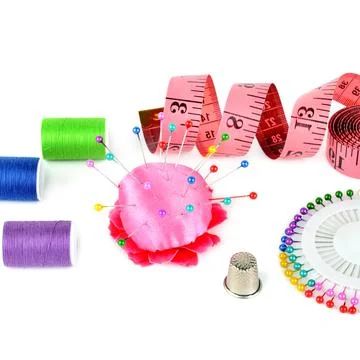 Composition with threads and sewing accessories isolated on white background. 스톡 사진