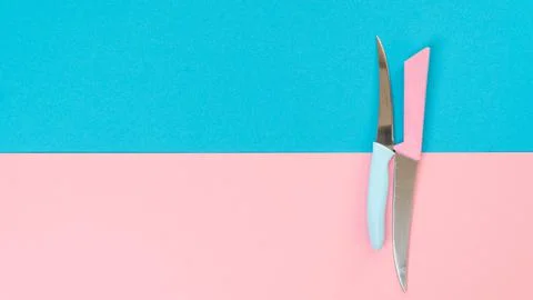 Composition of two colors - knives on a two-tone background Stock Photos