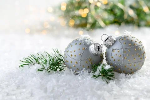 Composition with two silver Christmas balls. Stock Photos